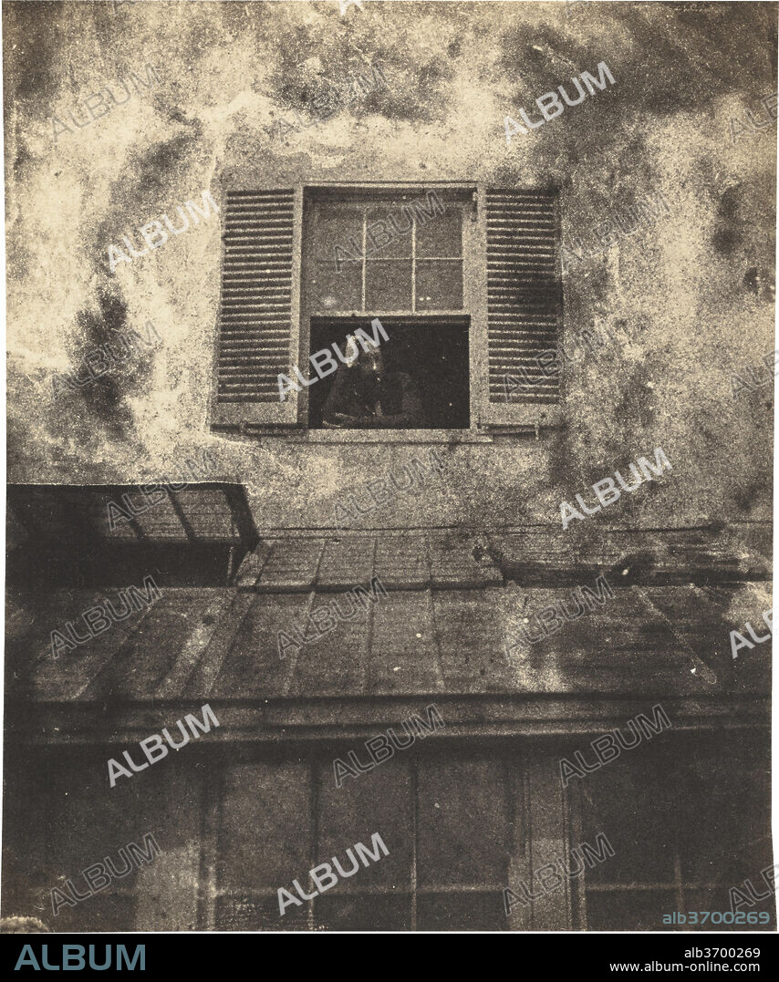 CHARLES-VICTOR HUGO WITH AUGUSTE VACQUERIE. Auguste Vacquerie at a Window, Marine Terrace. Dated: c. 1853. Dimensions: image: 9.2 × 7.7 cm (3 5/8 × 3 1/16 in.)  mount: 25.1 × 18.5 cm (9 7/8 × 7 5/16 in.). Medium: salted paper print from waxed-paper negative.