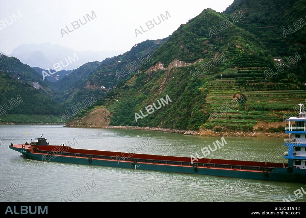 The Three Gorges or Yangtze Gorges span from the western—upriver cities of Fengjie and Yichang in Chongqing Municipality eastward—downstream to Hubei province. The Yangtze River (Chang Jiang)—Three Gorges region has a total length of approximately 200 kilometres (120 mi). The Three Gorges occupy approximately 120 kilometres (75 mi) within this region.  The Chang Jiang (Yangzi River) is the longest river in China and third longest in the world. Known upstream as the Golden Sand River, it flows through the geographical, spiritual and historical heart of China. From its source in the Tanggula Mountains of Qinghai province, the Yangzi flows southeast through Tibet as the Tongtian, turns south, then north as the Jinsha, and becomes the Yangzi proper after Yibin in Sichuan. Here, it swings eastwards once again, crossing Hubei, Hunan, Jiangxi, Anhui and Jiangsu provinces to reach the East China Sea at Shanghai. Its source-to-mouth length is 6,300 km (3,915 miles).
