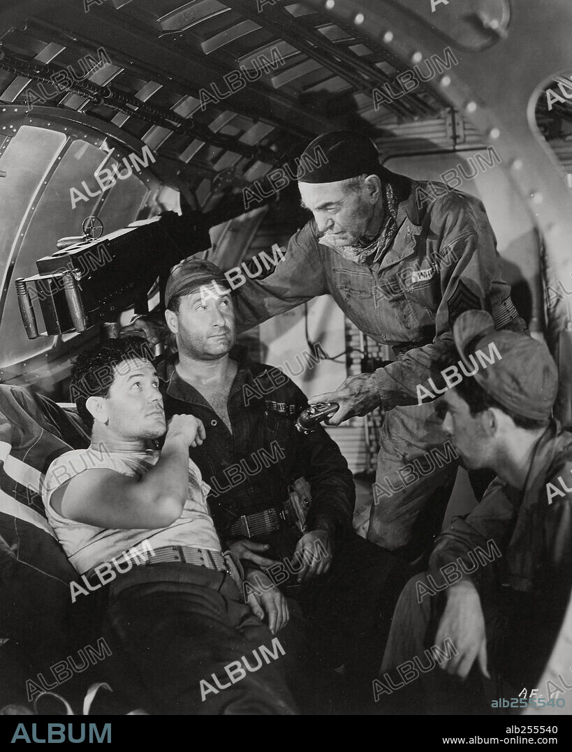 GEORGE TOBIAS and JOHN GARFIELD in AIR FORCE, 1943, directed by HOWARD HAWKS. Copyright WARNER BROTHERS.