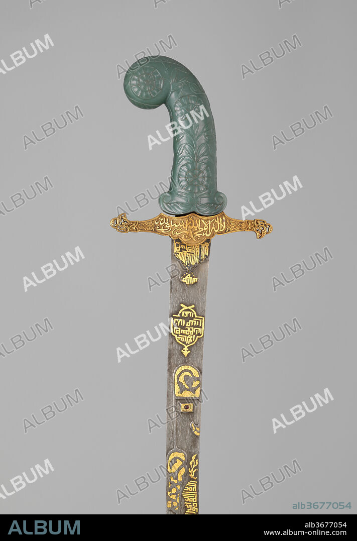Sword (Kilij). Culture: hilt and guard, Turkish; grip, Indian. Dimensions: L. 37 5/8 in. (95.6 cm). Date: hilt and guard, 19th century; grip, possibly 18th century.
The inscriptions on the sword invokes Allah, the Prophet Muhammad, and 'Ali. On the sword's blade is the <i>Ayat al-Kursi</i> (Throne Verse, 2:255), a popular talisman throughout the Islamic world.