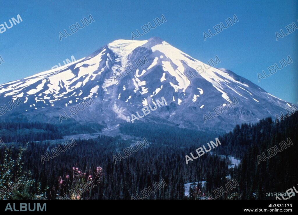 Southeast side of Mount St. Helens, showing Shoestring Glacier. This pre-1980 view of Mount St. Helens shows the volcano's southeast flank and the headwaters of the Muddy River before the May 18th, 1980 eruption. The broad forested area in the foreground is underlain by many layers of volcanic deposits, chiefly lahars and pyroclastic flows generated from past eruptions of Mount St. Helens.
