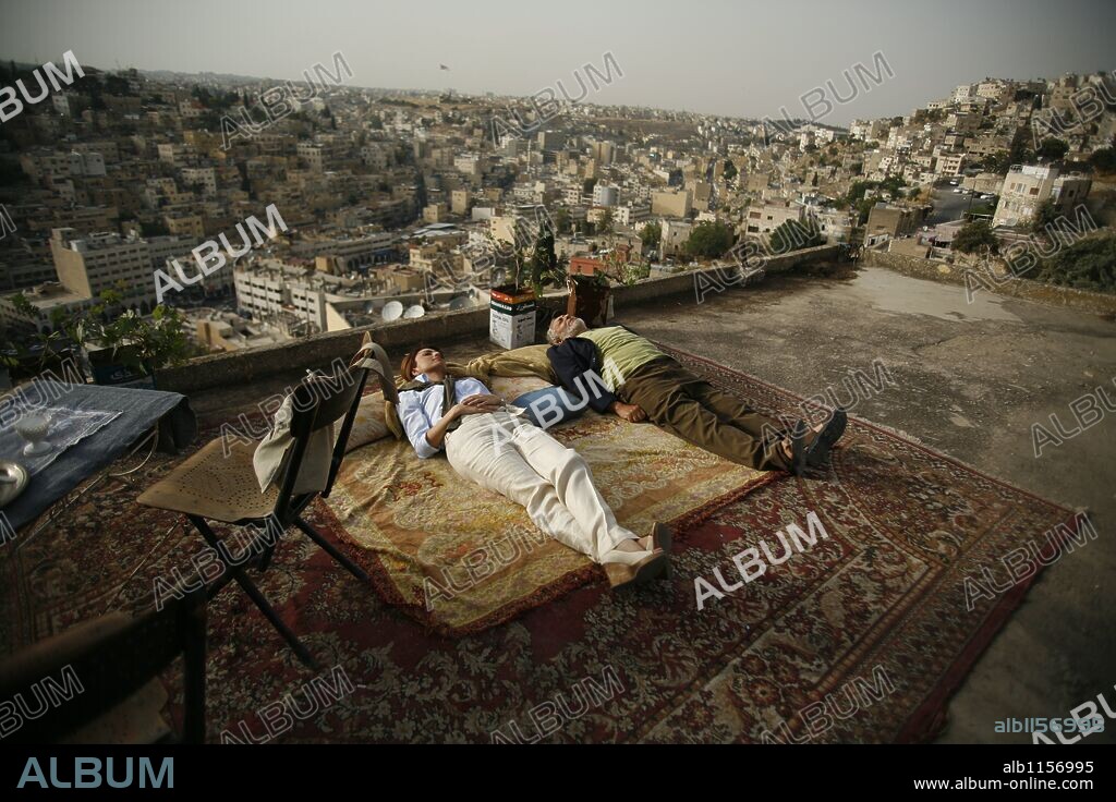 NADIM SAWALHA and RANA SULTAN in CAPTAIN ABU RAED, 2007, directed by AMIN MATALQA. Copyright Paper and pen films/ GigaPix studios.