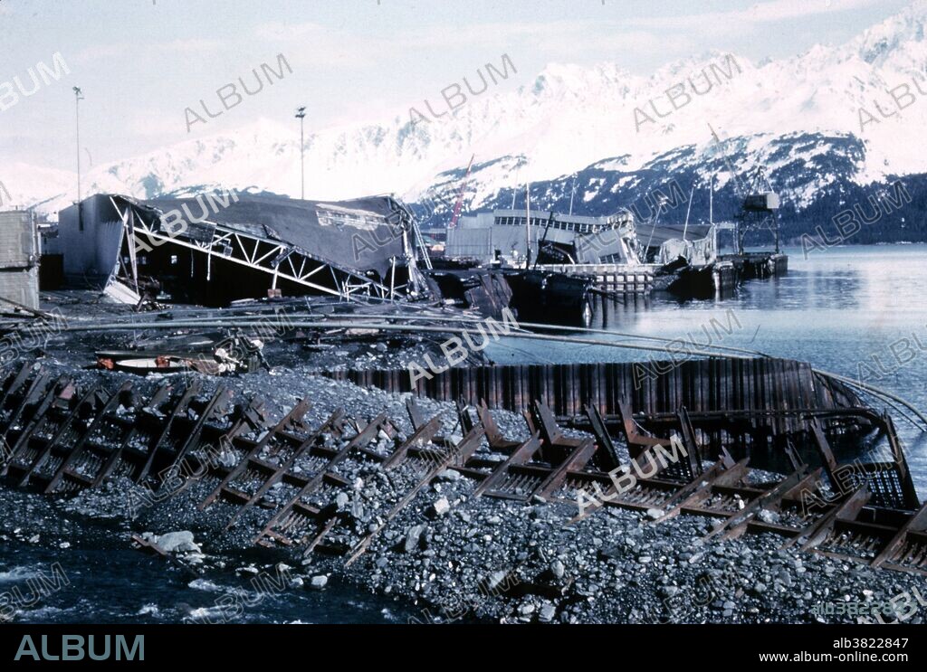 The 1964 Alaskan earthquake, also known as the Great Alaskan Earthquake, the Portage Earthquake and the Good Friday Earthquake, was a megathrust earthquake that began at 5:36 P.M. AST on Good Friday, March 27, 1964. Lasting nearly four minutes, it was the most powerful recorded earthquake in US and North American history, and the second most powerful ever measured by seismograph. This shock generated a tsunami that devastated many towns along the Gulf of Alaska, and left serious damage at Alberni and Port Alberni, Canada, along the West Coast of the United States (15 killed), and in Hawaii. The maximum wave height recorded was 220 feet at Valdez Inlet. It had a magnitude of 9.2, at the time making it the second largest earthquake in recorded history. Photo originally captioned: "Alaska 1964. Good Friday earthquake and tsunami damage.".