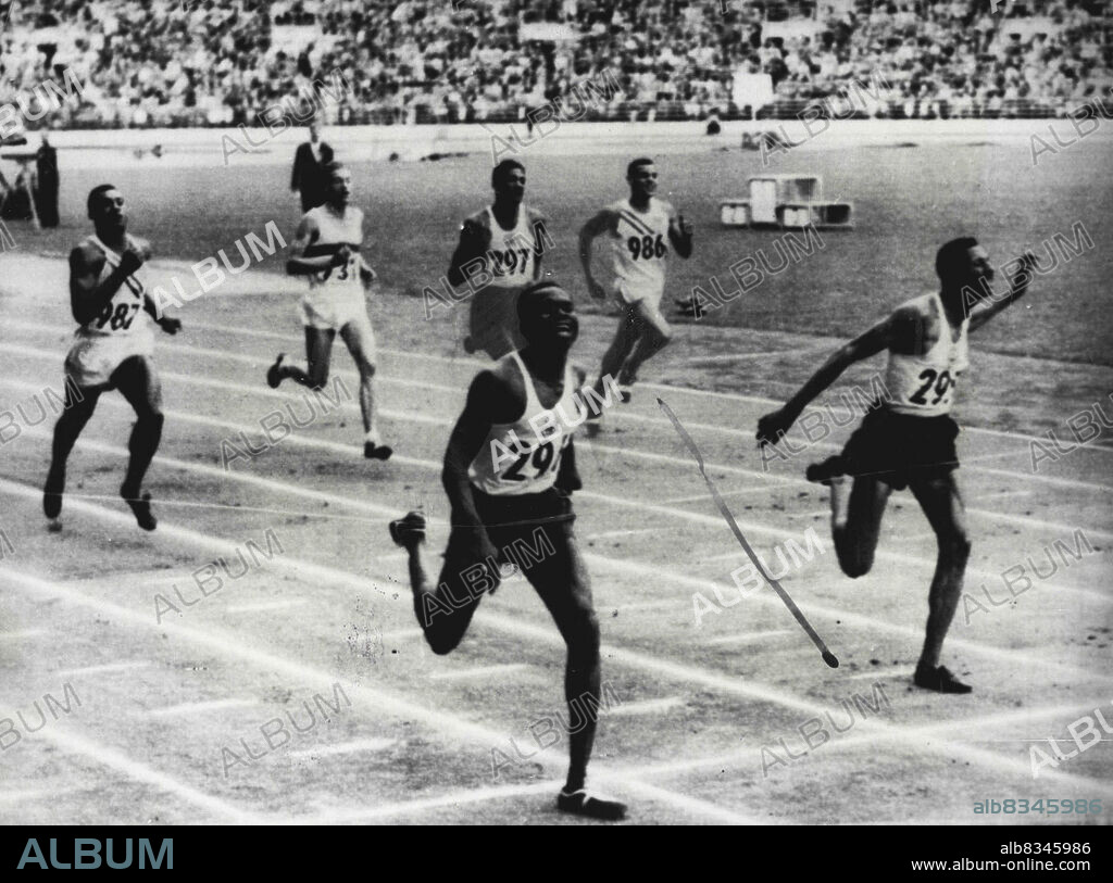 Rhodes Wins 400-Metre Final -- George Rhoden of Jamaica (left foreground) wins the final of the 400-metre event at Helisinki today July 25 in 45.9 seconds - breaking the Olympic record set at 46.2 by Arthur ***** of Jamaica in 1948.Second place went to herb McKeneley of Jamaica (right).The remainder of the field are, left to right: Ollie Matson of USA (Third) Mal Whitfield of USA (Sixth); Arthur Wint of Jamaica (Fifth), and Karl Haas of Germany (Fourth). July 25, 1952. (Photo by Olympic World Photo).