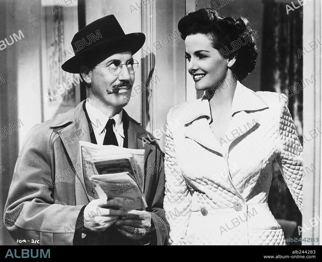 GROUCHO MARX and JANE RUSSELL in DOUBLE DYNAMITE, 1951, directed by IRVING CUMMINGS. Copyright RKO.