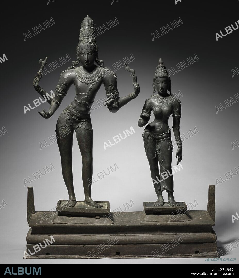 Shiva and Parvati, c. 950-960. South India, Tamil Nadu, Chola period (900-13th Century). Bronze; base: 21.6 x 79.5 x 24.9 cm (8 1/2 x 31 5/16 x 9 13/16 in.); part 1: 81.9 x 48.7 cm (32 1/4 x 19 3/16 in.); part 2: 65.1 x 16.5 cm (25 5/8 x 6 1/2 in.).