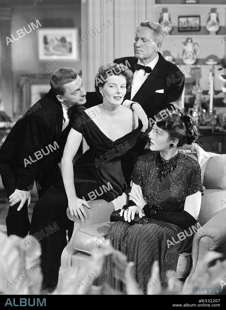 DAVID WAYNE, KATHARINE HEPBURN and SPENCER TRACY in ADAM'S RIB, 1949, directed by GEORGE CUKOR. Copyright M.G.M.