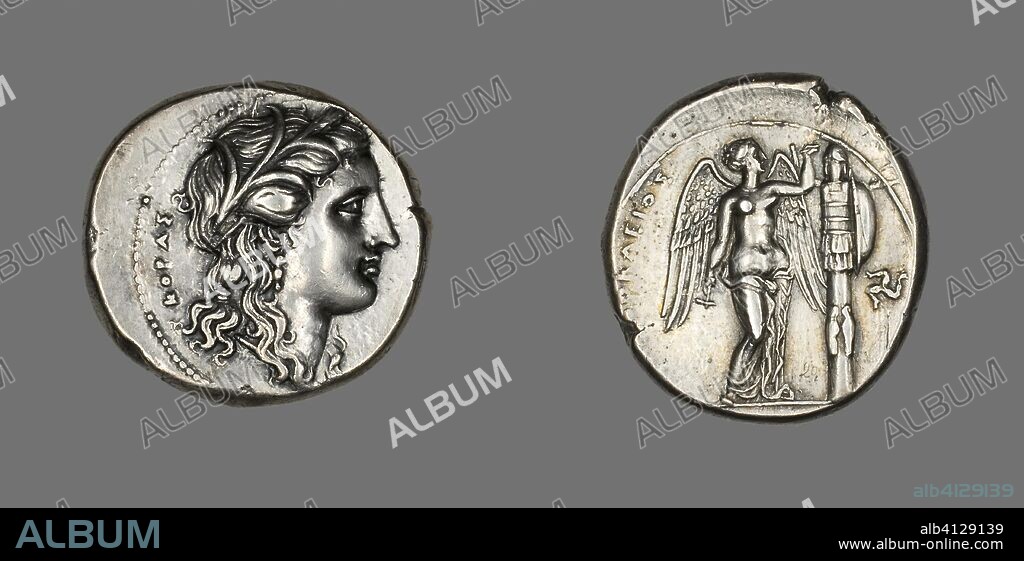 ANCIENT GREEK. Tetradrachm (Coin) Depicting the Goddess Persephone. Greek, minted in Syracuse, Sicily. Date: 310 BC-307 BC. Dimensions: Diam. 2.8 cm; 17.02 g. Silver. Origin: Syracuse.