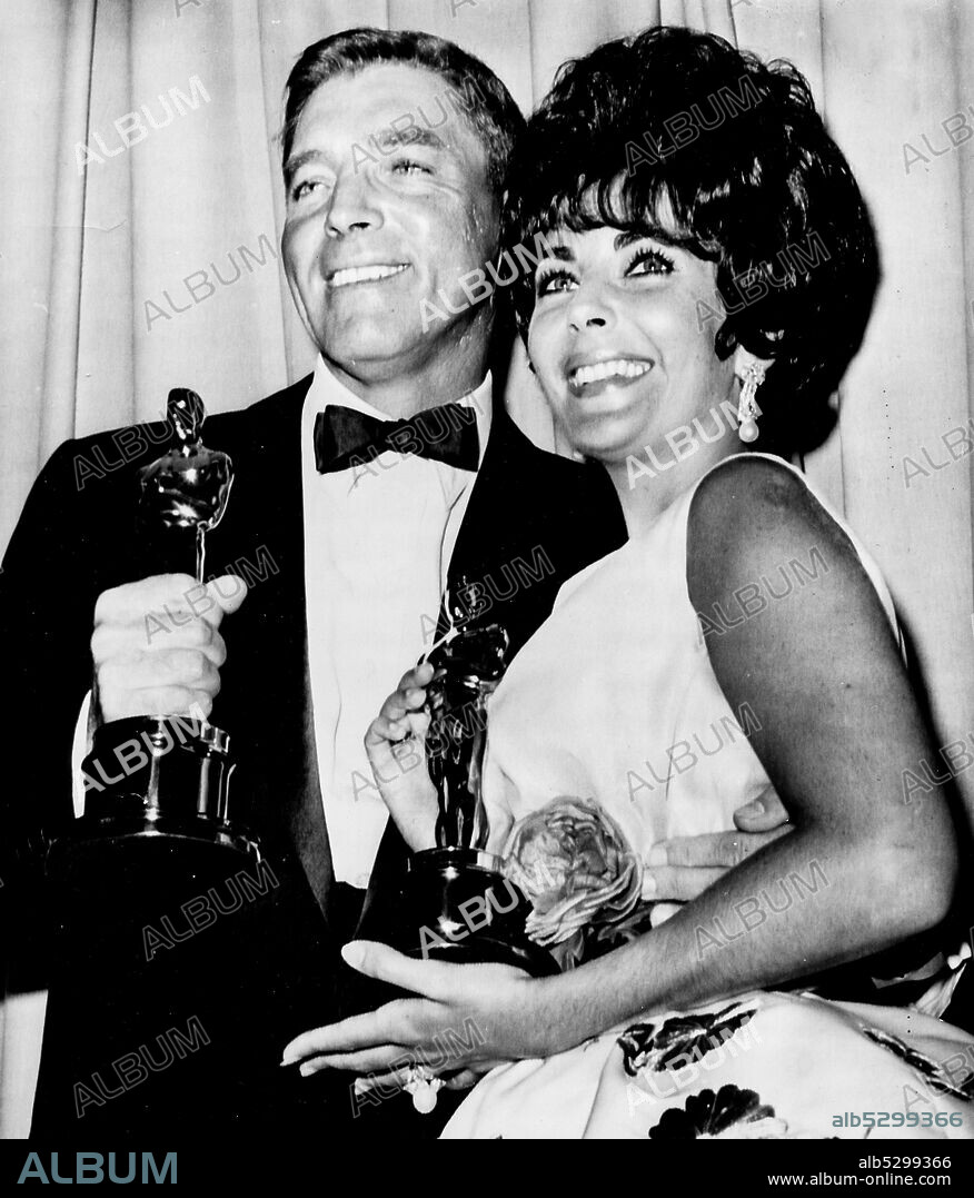 Elizabeth taylor. burt lancaster. academy award. 1961. (Photo by: Marka/Universal Images Group via Getty Images).
