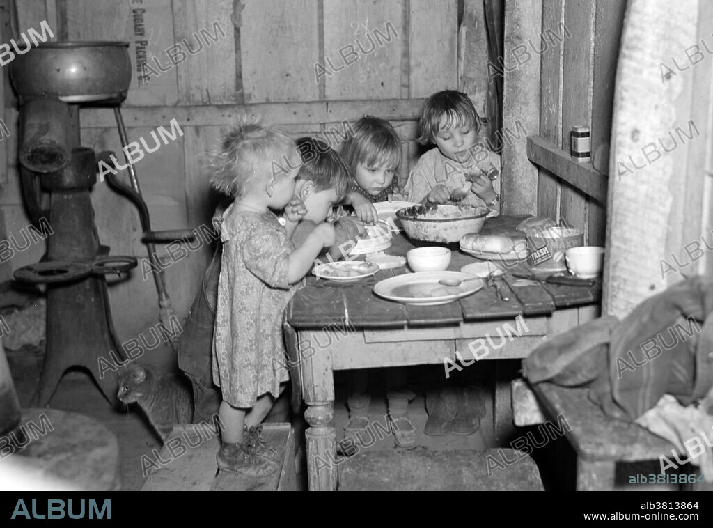 Entitled: "Christmas dinner in home of Earl Pauley. Near Smithfield, Iowa. Dinner consisted of potatoes, cabbage and pie." For most families during the Great Depression, Christmas was not a time for extravagance. Money and jobs were difficult to come by, and it was all some families could do to keep food on the table. The Great Depression was a severe worldwide economic depression in the decade preceding World War II. The depression originated in the U.S., after the fall in stock prices that began around September 4, 1929 and became worldwide news with the stock market crash of October 29, 1929 (known as Black Tuesday). Farming and rural areas suffered as crop prices fell by approximately 60%. Facing plummeting demand with few alternate sources of jobs, areas dependent on primary sector industries such as cash cropping, mining and logging suffered the most. Photographed by Russell Lee, December, 1936.