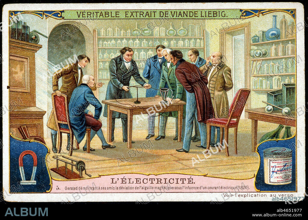 Hans Christian OERSTED (1777-1851) demontrant en 1820 a ses amis la deviation de l'aiguille magnetique sous l'influance de l'electricite. Illustration anonyme pour un chromo publicitaire Liebig. Credit : Collection KHARBINE-TAPABOR.