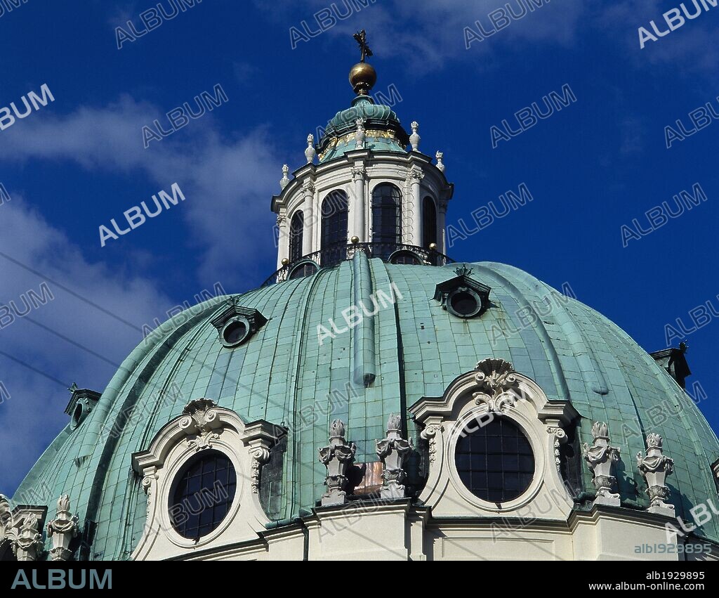 Johann Bernhard Fischer von Erlach (1656-1723). Karlskirche (St. Charles Church). Baroque style. 1716-1737. Dedicated to St. Charles Borromeo. Detail of the great dome crowned by a cross. Vienna. Austria.