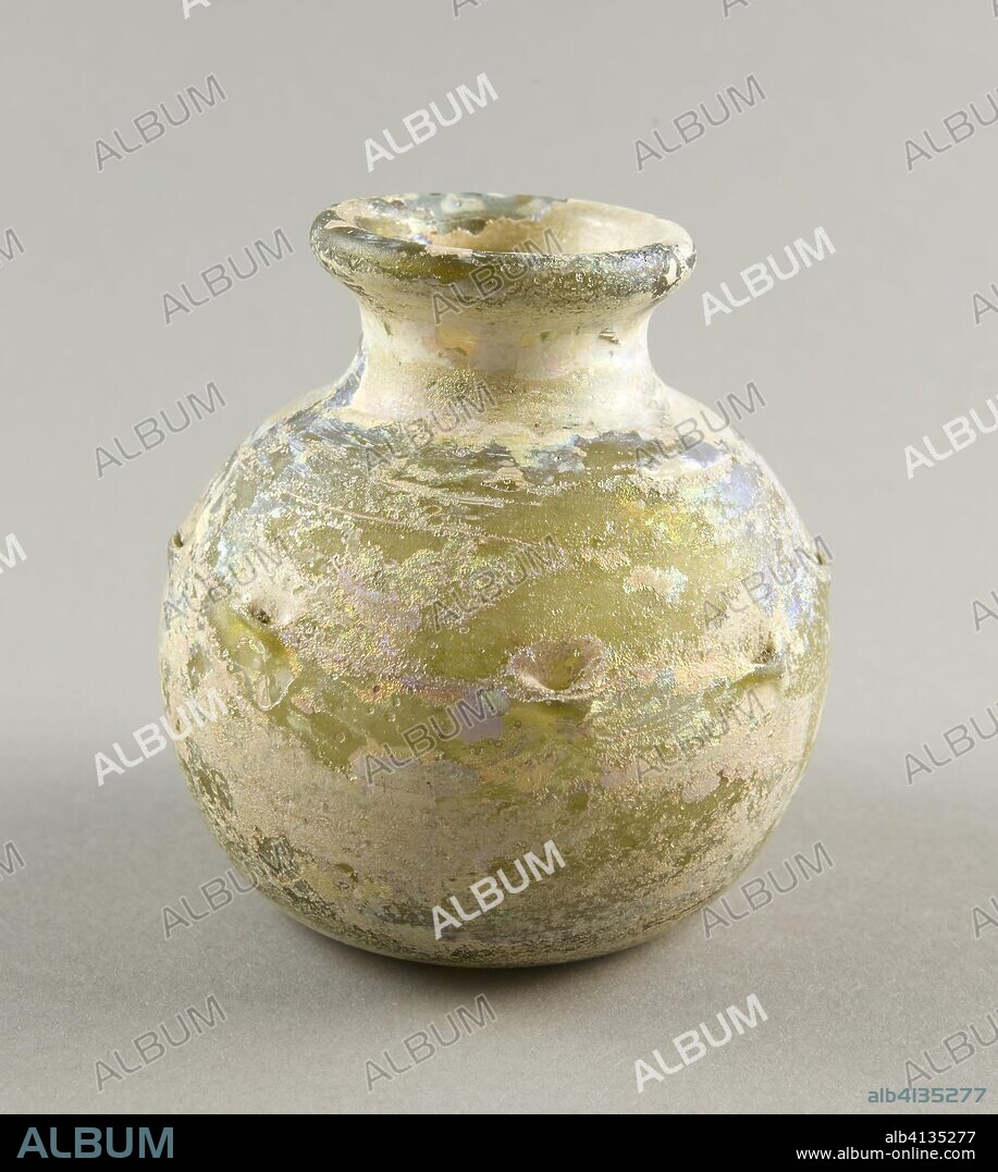 ANCIENT ROMAN. Jar. Roman; Levant or Syria. Date: 101 AD-400 AD. Dimensions: H. 9.2 cm (3 5/8 in.); diam. 8.3 cm (3 1/4 in.). Glass, blown technique. Origin: Syria.