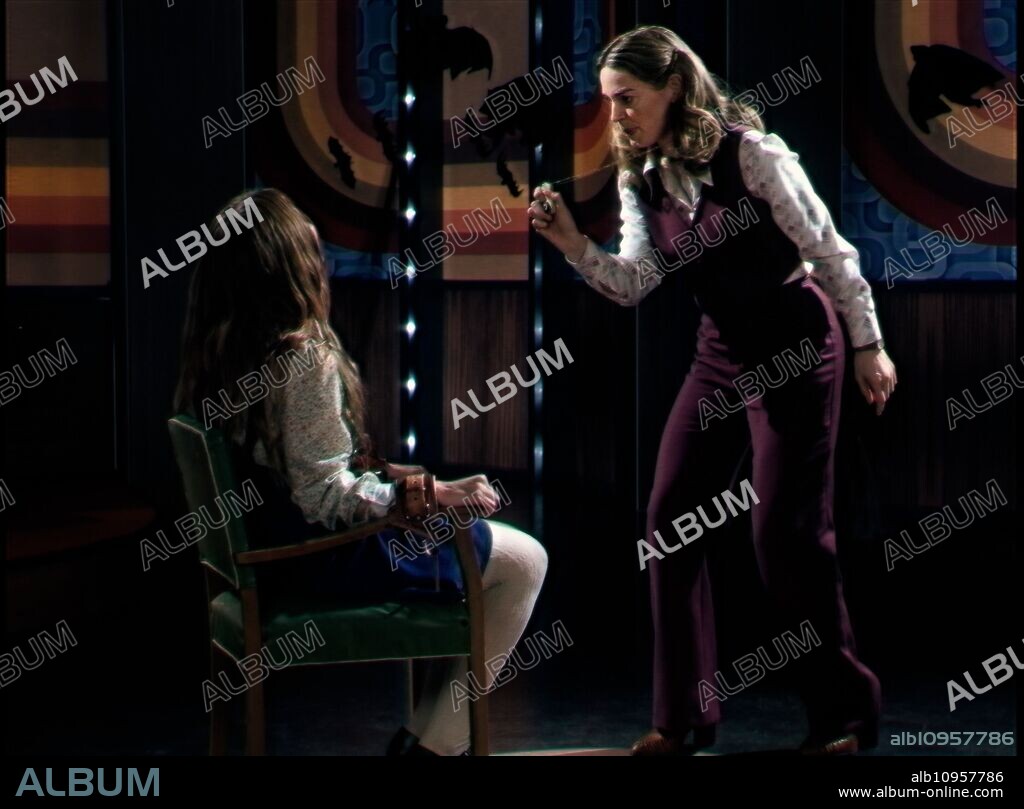 Ingrid Torelli and Laura Gordon in LATE NIGHT WITH THE DEVIL, 2023, directed by CAMERON CAIRNES and COLIN CAIRNES. Copyright Future Pictures/Image Nation/Spooky Pictures.