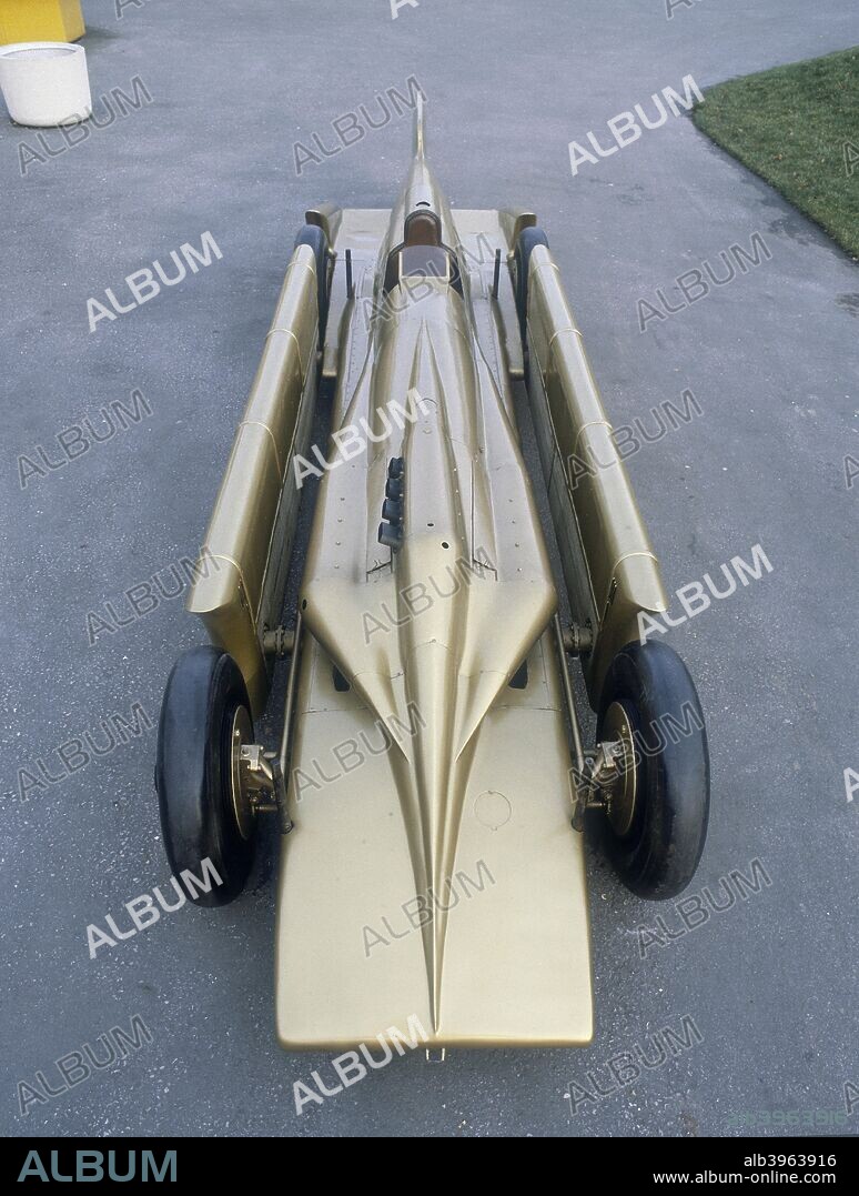 1929 Golden Arrow. Following his record breaking success with the 1000hp Sunbeam, Henry Segrave announced a new attempt was to be made in an all-new car. The Golden Arrow was designed by JS Irving and used a Napier Lion aero-engine of the Special 930 hp Schneider Trophy Type. The twelve cylinders were in a W formation. The car's low line design was achieved by the use of twin propeller shafts each side of the driver. Segrave drove Golden Arrow to a new record of 231.362 mph (372.341 kph) at Daytona Beach, Florida, on 11th March 1929.