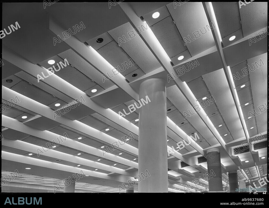 MARGARET F HARKER. Royal Festival Hall, Belvedere Road, South Bank, Lambeth, Greater London Authority, 1951. Interior view of the hall's foyer, looking up towards the ceiling and showing some of its main supporting pillars.