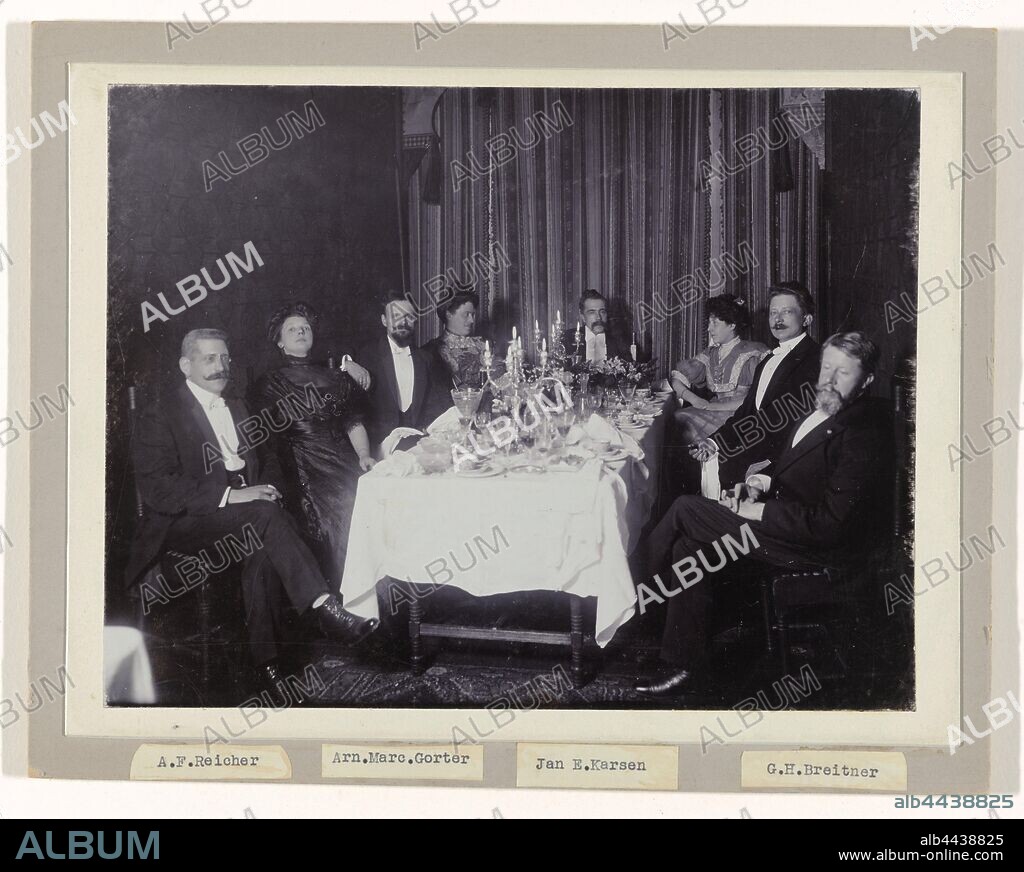 Group portrait of Arti board members with their ladies at a dinner, Group portrait at a dinner: from left to right chairman A.F. Reicher, Marie Breitner-Jordan, chairman Arnold Marc Gorter, Mrs. P. 't Hooft-Spakler, second secretary Ed. Karsen, Mrs. F. Gorter-Hertz, Treasurer C.G. 't Hooft and second chairman G.H. Breitner. Annotation on the reverse: from Lings to Rechtsch Reicher Marie Gorter Mrs. Karsen Mrs. Gorter myself., Arnold Marc Gorter, Albrecht Felix Reicher, Arti et Amicitiae, anonymous, 1891, paper, photographic paper, cardboard, h 174 mm × w 227 mm.