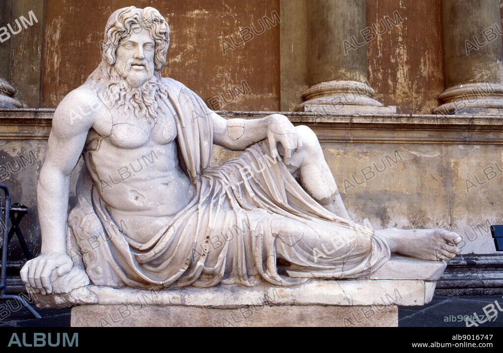 Roman statue of a reclining sea god, Cortile della Pigna. Vatican, Rome, Italy.