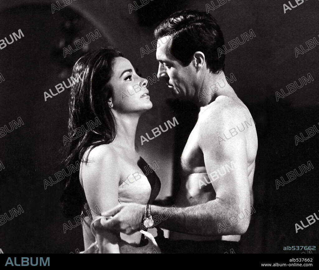 FREDERICK STAFFORD and KARIN DOR in TOPAZ, 1969, directed by ALFRED HITCHCOCK. Copyright UNIVERSAL PICTURES.