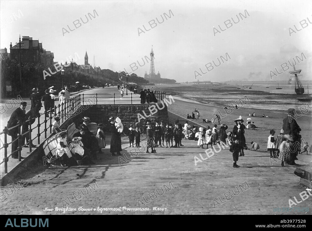Egremont Promenade, New Brighton, Wallasey, Cheshire, 1898-1910. A view along Egremont Promenade towards New Brighton Tower. A group of children stand in the foreground enjoying a day out by the seaside.