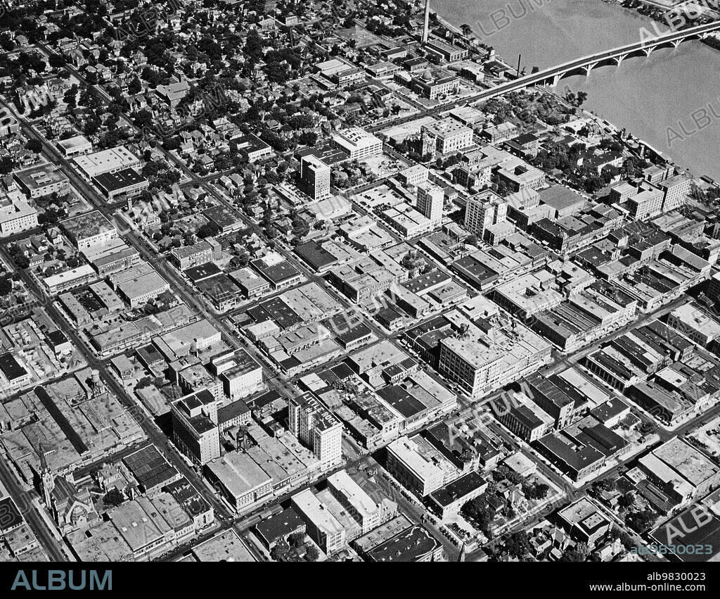 Little Rock, Arkansas: circa 1939, Aerial view of Little Rock cityscape with a bridge on Arkansas River in background.