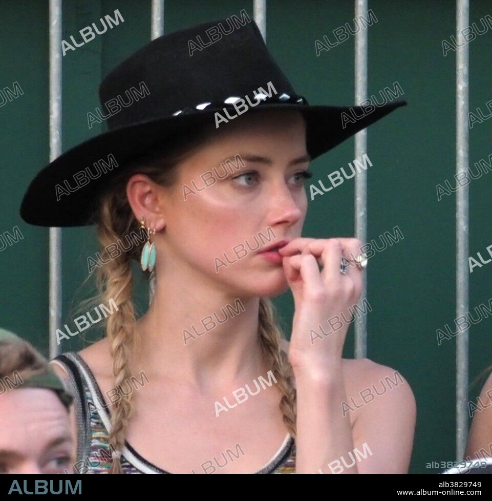 LONDON, ENGLAND - JULY 06: Amber Heard and new her beau 31 year old Vito Schnabel (Heidi Klum's ex Boyfriend)snuggle and stare at each other as they attend day five of the Wimbledon Tennis Championships at the All England Lawn Tennis and Croquet Club on July 6, 2018 in London, England..People: Amber Heard, Vito Schnabel. 06/07/2018