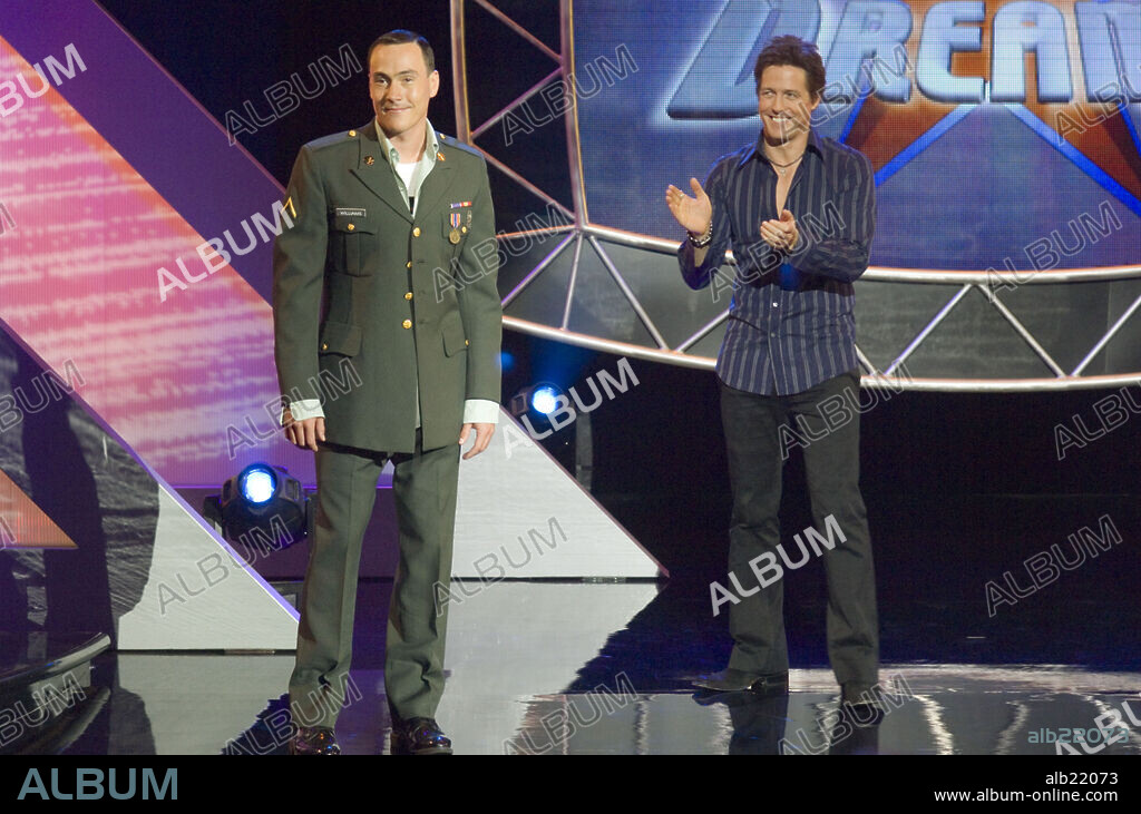 CHRIS KLEIN y HUGH GRANT en AMERICAN DREAMZ, 2006, dirigida por PAUL WEITZ. Copyright UNIVERSAL PICTURES / WILSON, GLEN.