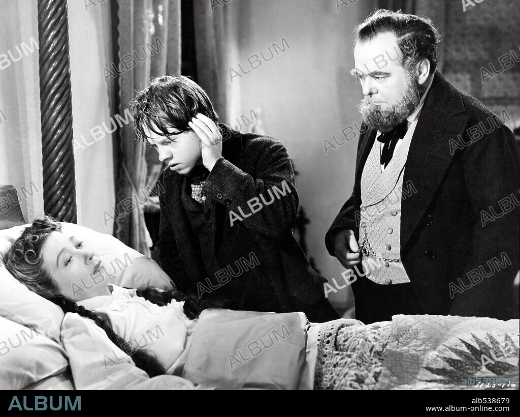 FAY BAINTER, LLOYD CORRIGAN and MICKEY ROONEY in YOUNG TOM EDISON, 1940, directed by NORMAN TAUROG. Copyright M.G.M.