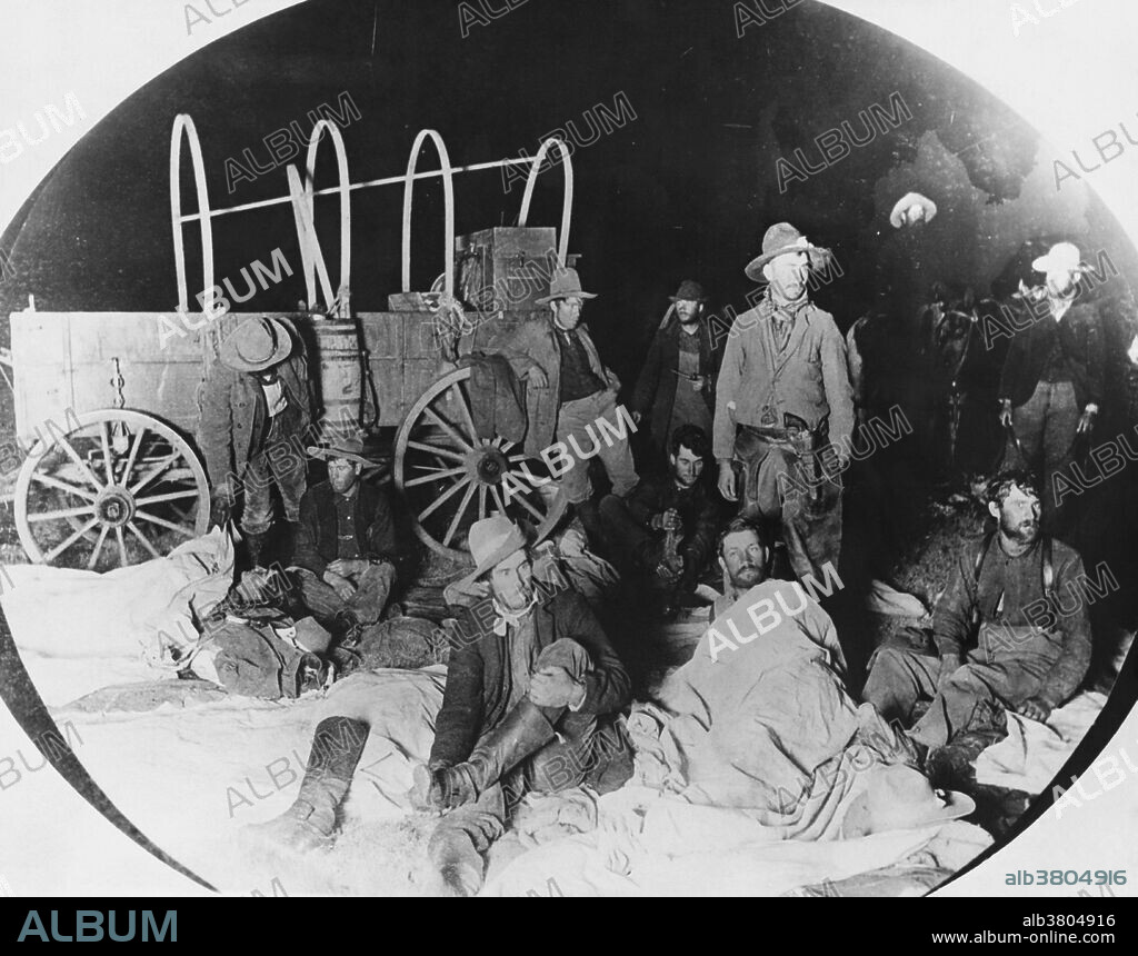 A cowboy camp at night in the 1880's, with some cowboys bedding down while others prepare to head out for night duty, watching over the herd. The historic American cowboy of the late 19th century arose from the vaquero traditions of northern Mexico and became a figure of special significance and legend. By the late 1860s, following the American Civil War and the expansion of the cattle industry, former soldiers from both the Union and Confederacy came west, seeking work, as did large numbers of restless white men in general. A significant number of African-American freedmen also were drawn to cowboy life, in part because there was not quite as much discrimination in the west as in other areas of American society at the time. The average cowboy earned approximately a dollar a day, plus food, and, when near the home ranch, a bed in the bunkhouse, usually a barracks-like building with a single open room. Over time, the cowboys of the American West developed a personal culture of their own, a blend of frontier and Victorian values that even retained vestiges of chivalry. Such hazardous work in isolated conditions also bred a tradition of self-dependence and individualism, with great value put on personal honesty, exemplified in songs and poetry. Photograph by F. M. Steele.