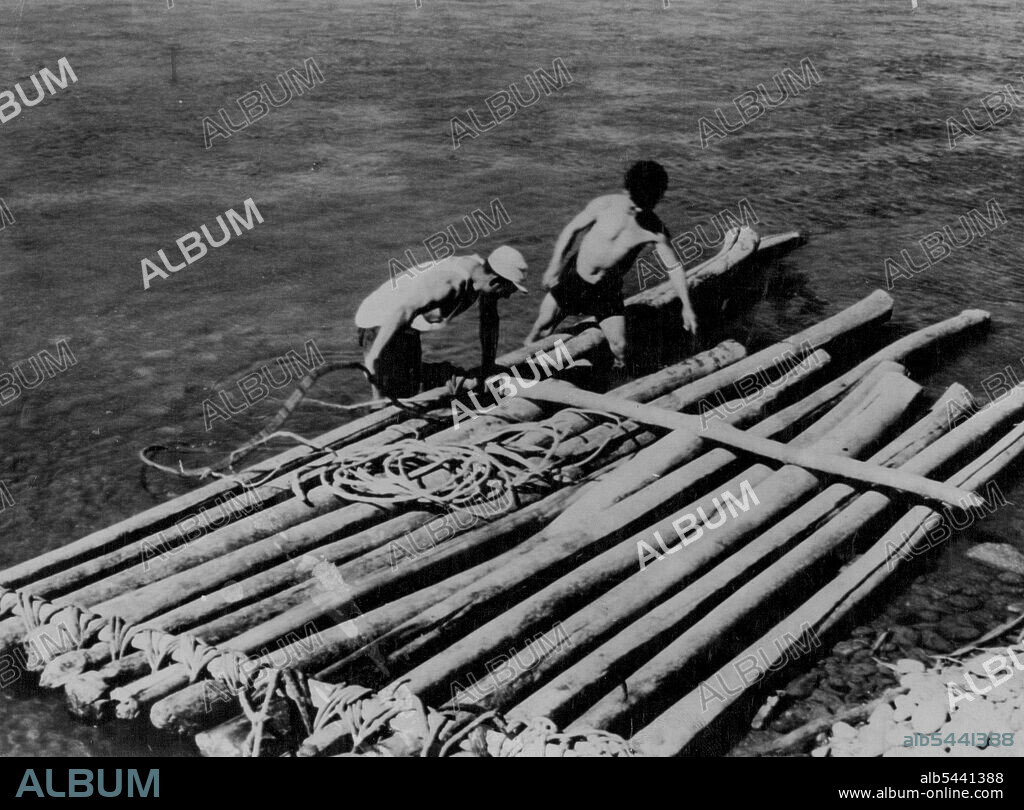 Snow help with the building of the balsa raft on the banks of the river Chinchipe. Build vines were used to bind the light log together. Helped by a friendly native, Snow built a new raft (left), trying the logs with vines. It also broke up. May 05, 1954.