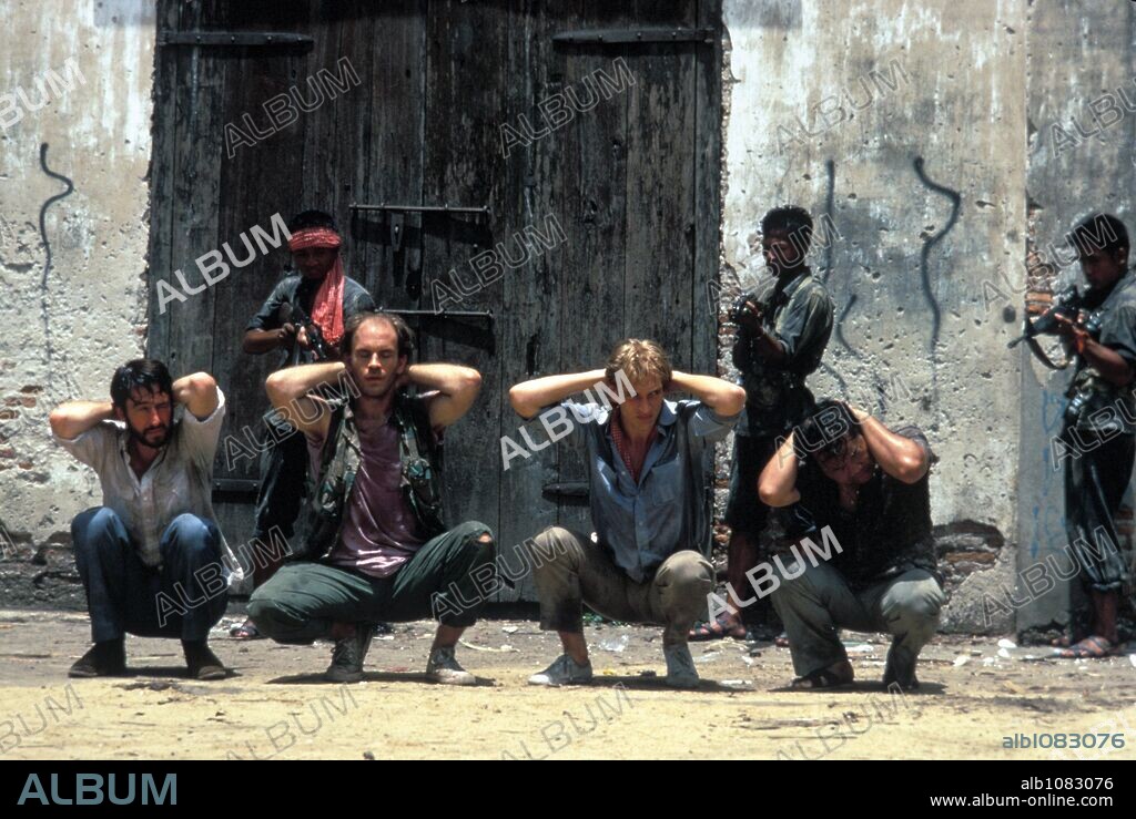 HAING S. NGOR, JOHN MALKOVICH, JULIAN SANDS and SAM WATERSTON in THE KILLING FIELDS, 1984, directed by ROLAND JOFFE. Copyright ENIGMA-GOLDCREST/WB.