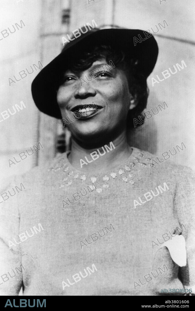 Zora Neale Hurston (January 7, 1891 - January 28, 1960) was an American folklorist, anthropologist, and author. When Hurston arrived in NYC in 1925, the Harlem Renaissance was at its peak, and she soon became one of the writers at its center. By the mid-1930s, she had published several short stories and the critically acclaimed Mules and Men (1935), a groundbreaking work of "literary anthropology" documenting African-American folklore from timber camps in North Florida. Her last published novel, Seraph on the Suwanee, notable principally for its focus on white characters, was published in 1948. Her work slid into obscurity for decades, for a number of cultural and political reasons. Many readers objected to the representation of African-American dialect in Hurston's novels, given the racially charged history of dialect fiction in American literature. She died of hypertensive heart disease in 1960, at the age of 69, and was buried in an unmarked grave. She was inducted as a member of the inaugural class of the New York Writers Hall of Fame in 2010. No photographer credited, dated circa 1935-43.