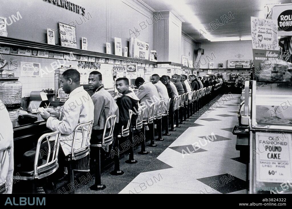 February 9, 1960, Charlotte, NC. The very first sit-in took place a week earlier in Greensboro, NC. The Charlotte sit-in was not well covered at the time, but it marked the fact that what had happened in Greensboro was spreading to other Southern cities. It was the college students from Johnson C. Smith University who took park in the sit-ins. These students also started picketing a downtown theatre to allow blacks to sit downstairs in the theater. The sit-ins had taken store management by surprise; the waitresses didn't know what to do and just faded away, leaving the students sitting at the counters. The students had told the chief of police what they were going to do in advance. The chief of police had promised to make no arrests if they did it in an orderly way and he kept his word; no police ever appeared at the Charlotte sit-ins and there were no arrests. After a few hours, the students left and the stores put up signs saying their lunch counters were temporarily closed. On July 3rd, the counters at Woolworth's were reopened to everyone.