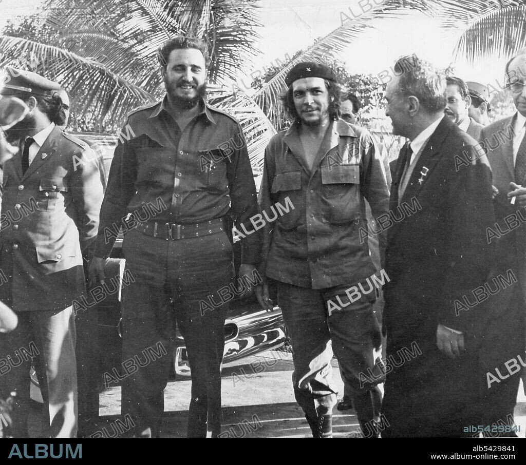 Cuban Premier Fidel Castro (left), Ernesto 'Che' Guevara, Cuban National Bank President (center), and Soviet First Deputy, Premier, Anastas Mikoyan (right) are shown together in the garden of the house that the Cuban government put at Mikoyan's disposal during his visit to the Latin American country. Havana, Cuba, 1960.