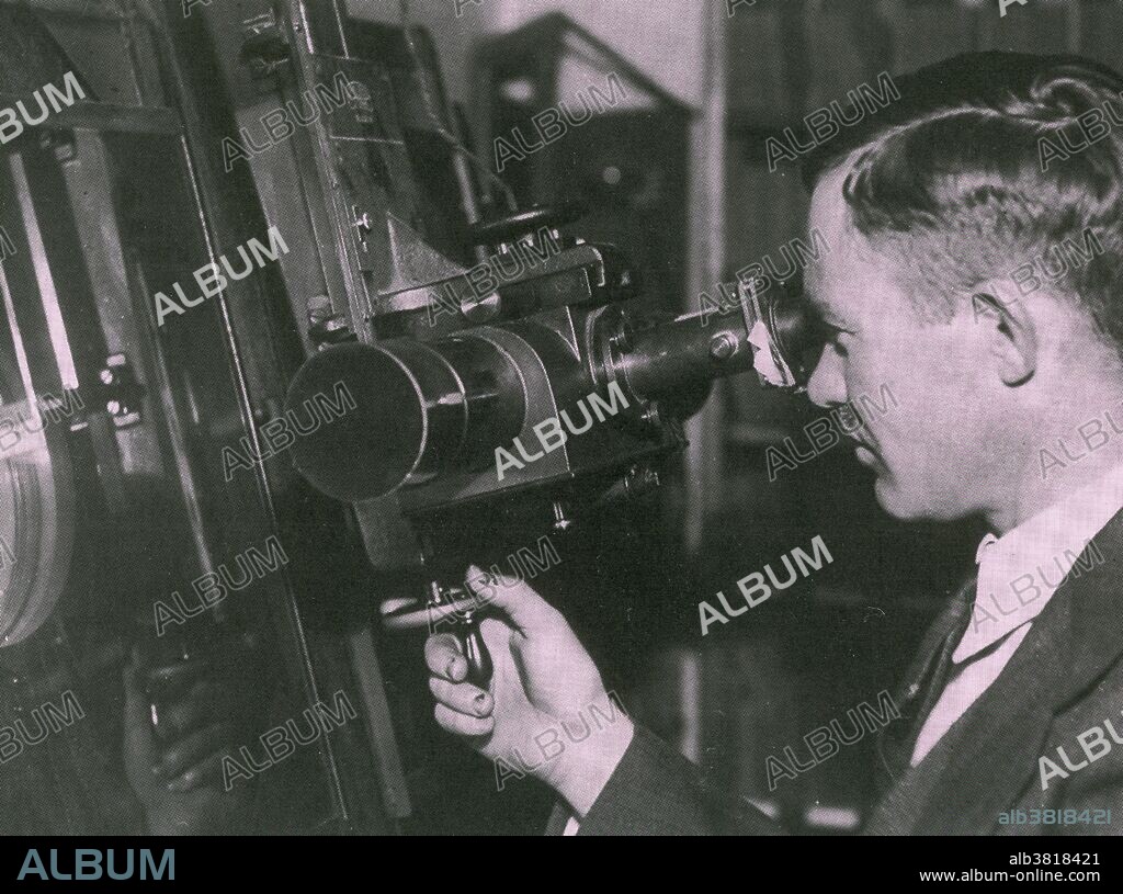Tombaugh using blink comparator. Clyde William Tombaugh (February 4, 1906 - January 17, 1997) was an American astronomer. He became an assistant at Lowell Observatory. Lowell predicted the existence of a ninth planet, and a team was set up to find it. Tombaugh invented the blink comparator to facilitate the search. This device allowed comparison of photographs of the sky to show if any object had altered position. In 1930 he discovered the dwarf planet Pluto. He also discovered nearly 800 asteroids and hundreds of variable stars, as well as star clusters, and galaxy clusters. He is credited with the discovery of periodic comet 274P/Tombaugh-Tenagra. He was the most eminent astronomer to have reported seeing unidentified flying objects and to support the extraterrestrial hypothesis. He died in 1997 at the age of 90. One ounce of his ashes is being carried on the New Horizons space probe. The container includes the inscription: "interned herein are remains of American Clyde W. Tombaugh, discoverer of Pluto and the solar system's 'third zone'. Adelle and Muron's boy, Patricia's husband, Annette and Alden's father, astronomer, teacher, punster, and friend: Clyde W. Tombaugh (1906-1997)".