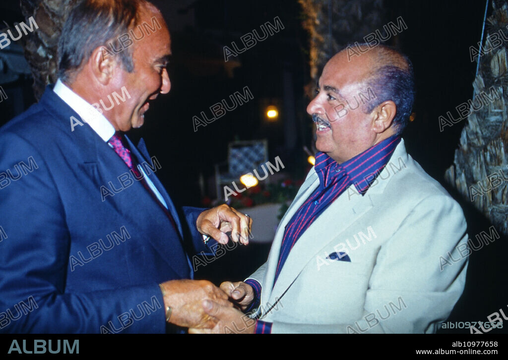 Adnan Khashoggi (right) meets Johannes Prince of Thurn and Taxis, 1985.