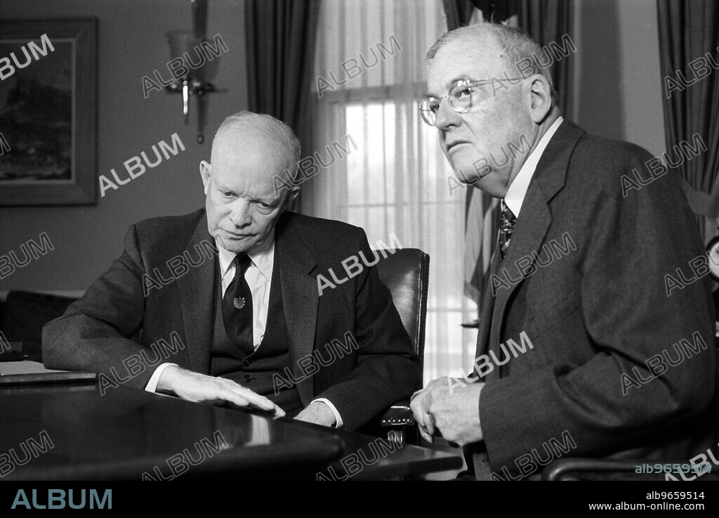 U.S. President Dwight D. Eisenhower with U.S. Secretary of State John Foster Dulles (right) in Oval Office, White House, Washington, D.C., USA, photograph by Marion S. Trikosko, December 11, 1957.