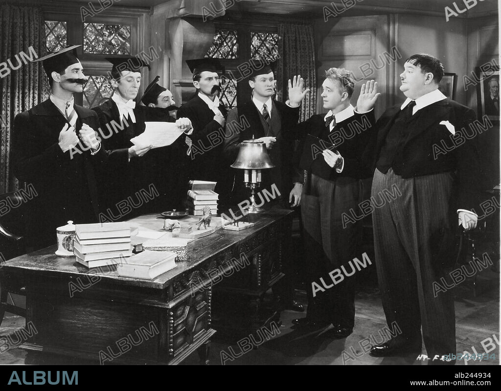 OLIVER HARDY, PETER CUSHING and STAN LAUREL in A CHUMP AT OXFORD, 1940, directed by ALF GOULDING. Copyright HAL ROACH/UNITED ARTISTS.