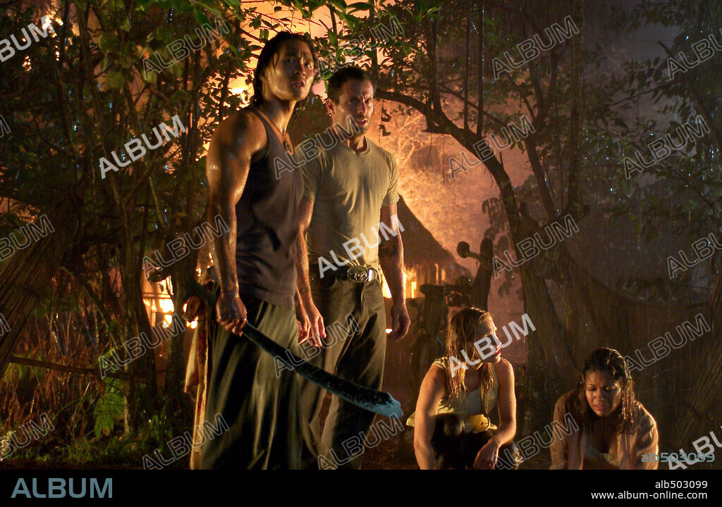 JOHNNY MESSNER, KADEE STRICKLAND and KARL YUNE in ANACONDAS: THE HUNT FOR THE BLOOD ORCHID, 2004, directed by DWIGHT H. LITTLE. Copyright COLUMBIA PICTURES.