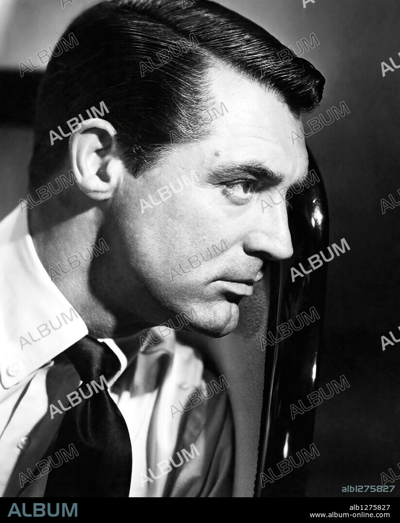 CARY GRANT en ENCADENADOS, 1946 (NOTORIOUS), dirigida por ALFRED HITCHCOCK. Copyright RKO RADIO PICTURES.
