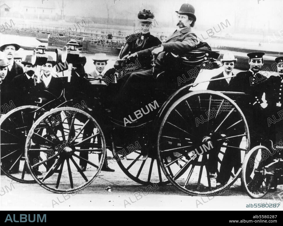 Benz, Karl Engineer (with Gottlieb Daimler inventor of the automobile). 1844-1929. Karl Benz with his wife Berta on the wheel of the automobile Benz Viktoria (model 1894). Photograph.