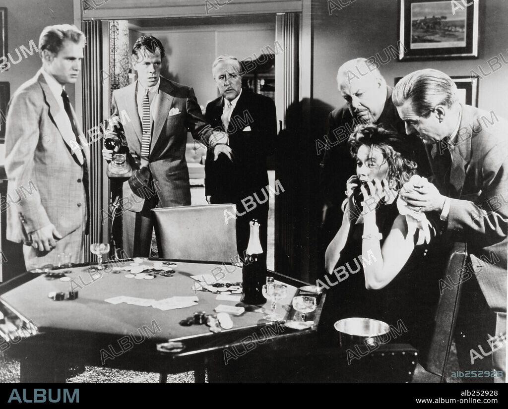 GLORIA GRAHAME y LEE MARVIN en LOS SOBORNADOS, 1953 (THE BIG HEAT), dirigida por FRITZ LANG. Copyright COLUMBIA PICTURES.