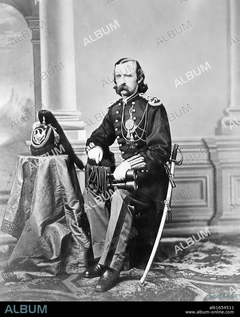 George Armstrong Custer (1839-1876) United States Army office and cavalry commander in American Civil War and Indian Wars. Defeated and killed at Battle of Little Bighorn in what is called Custer's Last Stand.  Photograph.
