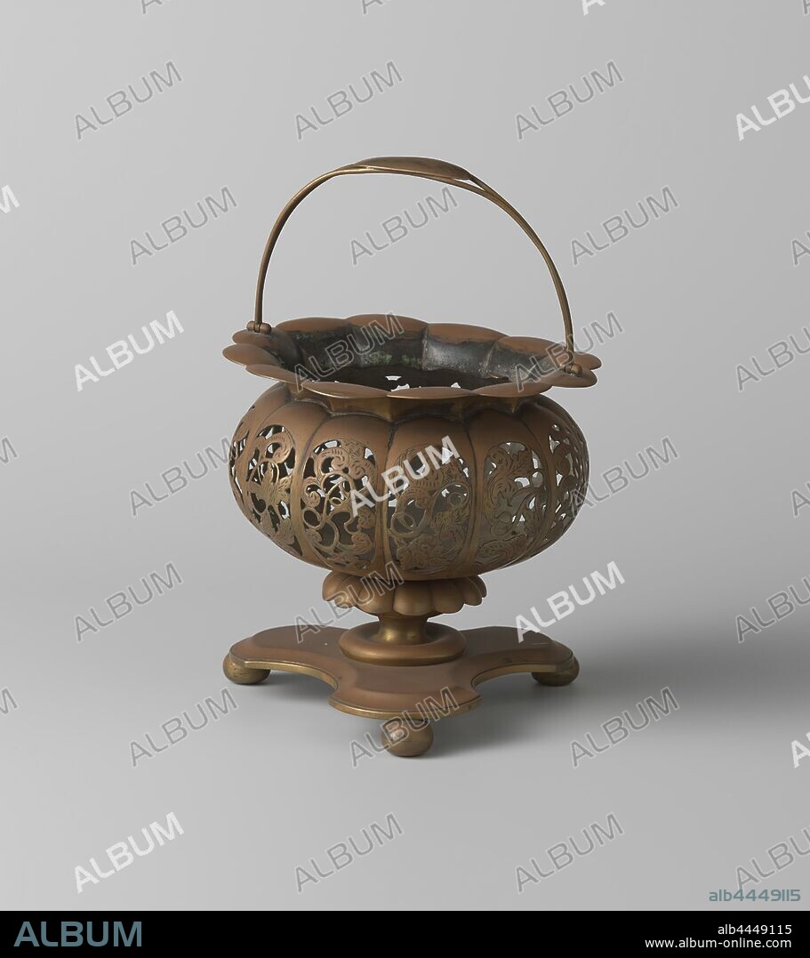 Chafing dish with openwork, spherical bowl in twelve sections, The chafing bowl composed of several parts stands on a three-leg base, has a nodus and a spherical bowl, which is divided into twelve sections. These have an engraved and sawn ornament with the name L. N. van Voorst. The bulged edge, to which the handle is attached, has four tabs on the inside for the missing grid., Louis Nicolas Seraphim van Voorst, Utrecht, c. 1850, brass (alloy), h 15.3 cm × d 14.6 cm.