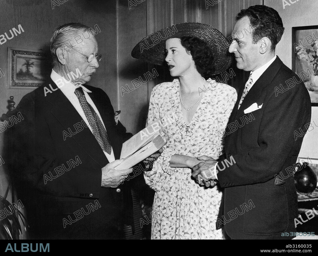 New Hope, Pennsylvania: August 10, 1946 Noted playwright Moss Hart and singer and actress Kitty Carlisle were wed today by Justice of the Peace John Simon at his home today.