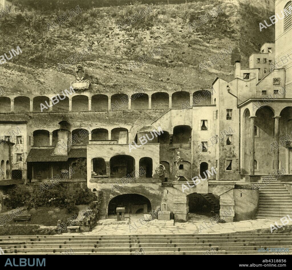 'Faust Town' in the Felsenreitschule, Salzburg, Austria, c1935. The Felsenreitschule (literally 'rock riding school'), built in a former quarry, was originally used as a summer riding school. From 1926 it was the setting for open-air theatre for performances of the Salzburg Festival. Fauststadt ('Faust Town') refers to a 1933 production of Goethe's "Faust". The theatre was one of the locations in the 1965 film "The Sound of Music". From "Österreich - Land Und Volk", (Austria, Land and People). [R. Lechner (Wilhelm Müller), Vienna, c1935].