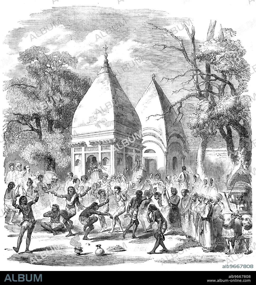 Hindoo Dance - from a native drawing, 1857. Devotees outside a temple in India. 'The dancing takes place in the open air, and behind may be seen the peculiar architecture of a Hindoo temple, with its superincumbent pyramid. "Duara Suarga," or Gate of Heaven, is sometimes inscribed at the entrance of these buildings. But an intelligent traveller says that the stealthy glances at a horrific group of diabolical idols, the strange noises, and the unequal and lurid flashes of light, when all around is darkness, made it much more like what imagination might picture as the entrance of the infernal regions [ie, Hell]. The form of the dome in our Illustration will forcibly remind travellers of the Pyramids of Sakarah, in Egypt'. From "Illustrated London News", 1857.