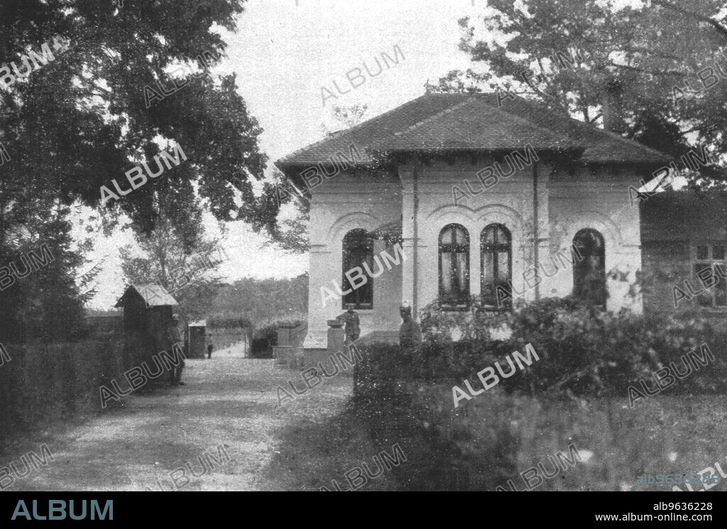 'Au quartier general du roi de Roumanie; le pavillon de chasse roi Ferdinandet le prince heritier ont etabli leur residence au debut de la campagne', 1916. From "Collection de la Guerre IV. L'Illustration Tome CXLVIII. La Guerre Juillet, Aout, Septembre, Octobre, Novembre, Decembre 1916". (At the headquarters of the King of Romania; the hunting lodge where King Ferdinand and the Crown Prince took residence at the start of the campaign).