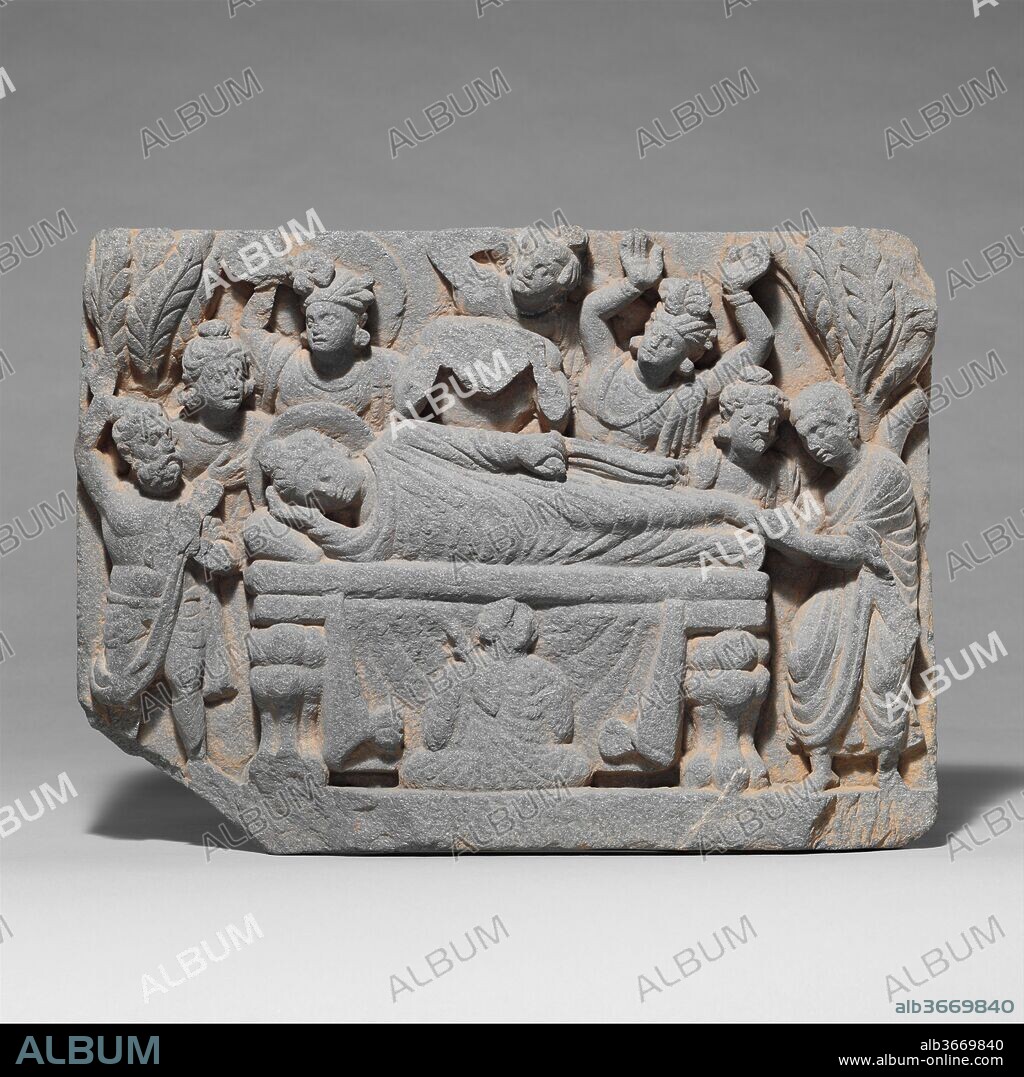 Death of the Buddha (Parinirvana). Culture: Pakistan (ancient region of Gandhara). Dimensions: H. 11 3/4 in. (29.8 cm); W. 6 3/16 in. (41.1 cm); D. 2 1/4 in. (5.7 cm). Date: 2nd-3rd century.