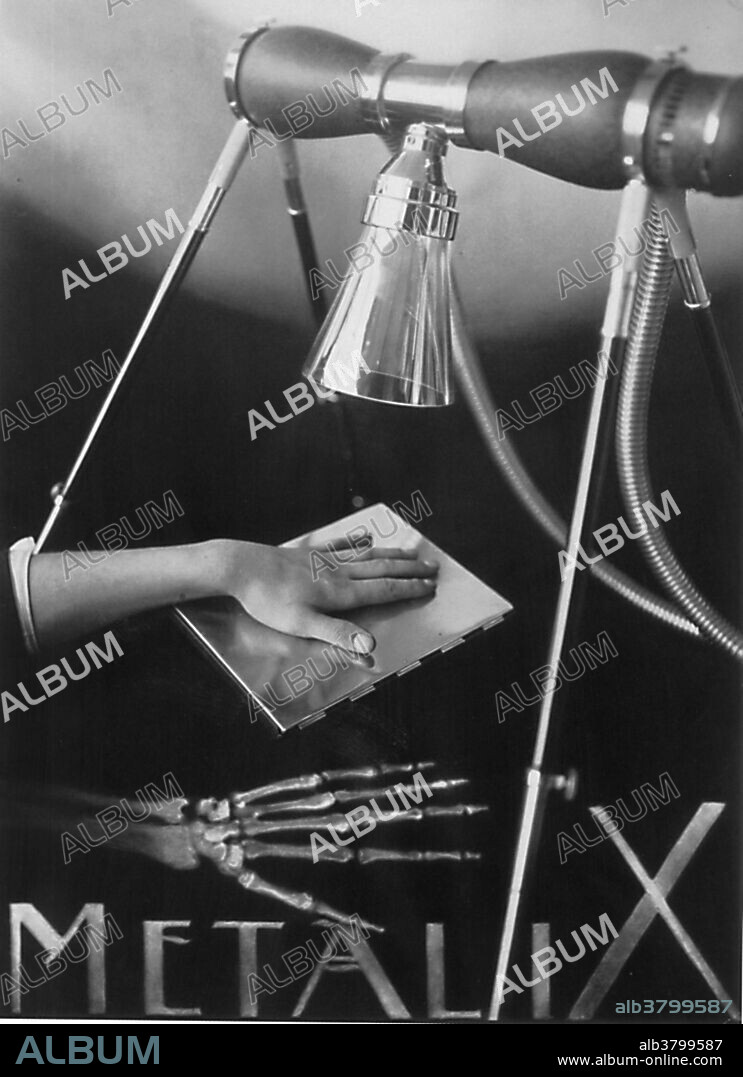 The famous Metalix tube made by the Philips/Muller Company. Philips (who only started making x-ray tubes in 1922) took over the C.H.F. Muller company in 1927. The innovative feature of the tube was the fact that the body (the canister) was a stainless steel cylinder fused at each end to glass tubes that held the anode and cathode. It was developed in the mid 1920s by A. Bouwers while working for Philips. Bouwers was the same individual who was primarily responsible for developing the first working x-ray tube with a rotating anode in 1929. The Metalix machine shown here with a superimposed x-ray of a hand beneath.